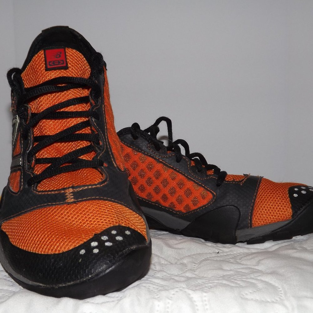 New Balance Minimus  SIZE 10.5 D ORANGE AND BLACK